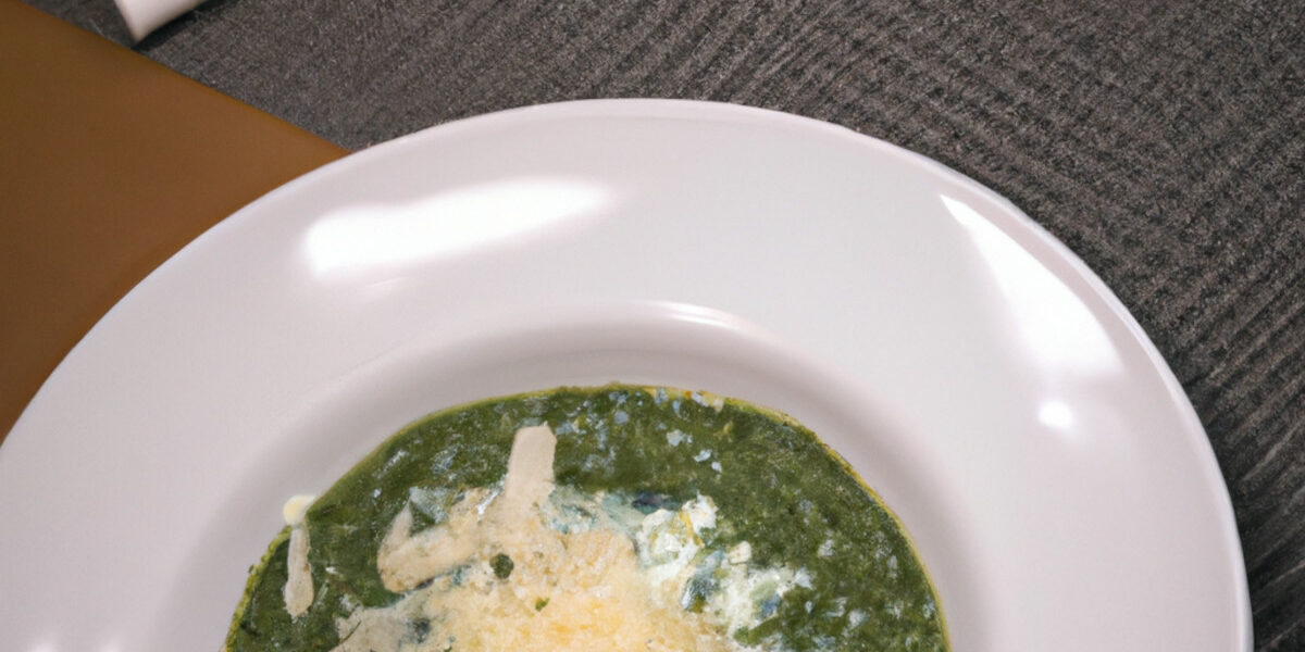green veggie soup with grated cheese