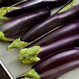the eggplants are brushed with olive oil and then placed on a baking sheet.