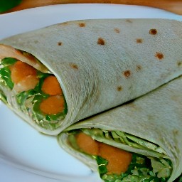 roasted butternut squash, arugula, and lime yogurt veggie flour tortilla wraps.