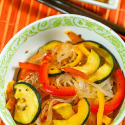 
This zesty veggie noodles is a delicious Asian-style lunch made with rice noodles, oranges, red bell peppers, zucchini, snow peas and chestnuts - all eggs-, nuts- and lactose-free.