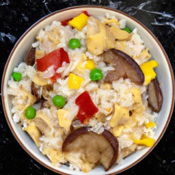 

This delicious European side dish is a stir-fry of red and yellow bell peppers, shiitake mushrooms, long grain rice and peas. It's also lactose-free and nut-free - perfect for those with allergies!