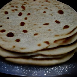 pittas that have been toasted in a toaster.