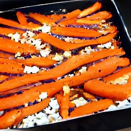 the lemon zest is scattered over the roasting tin.