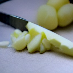 minced garlic, chopped onions, and chopped potatoes.