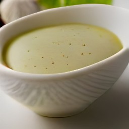 a bowl of garlic dressing.