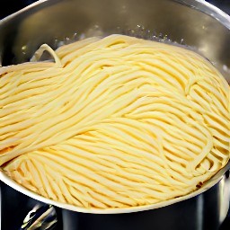 21 cups of water boiling with 1 tsp of salt added, and the linguine pasta cooking in it on medium heat for 10 minutes.