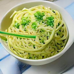 the noodles are transferred to a bowl and stirred with a wooden spoon. sesame seeds and scallion slices are scattered over the top.