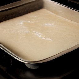 a rectangle dough that has been sprayed with cooking spray and set aside for 60 minutes.