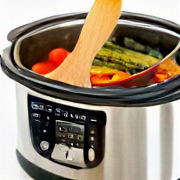 the lid is removed from the crock pot and the contents are stirred.