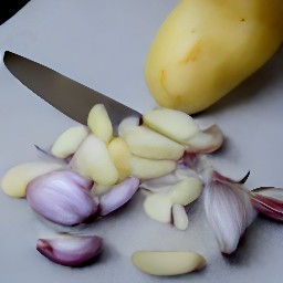 peeled potatoes, quartered shallots, and peeled garlic cloves.