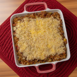 

This delicious Spicy Quinoa Casserole is a nourishing gluten-free, eggs-free, nuts-free and soy- free baked dinner dish made of tomatoes, black beans, corn, quinoa and cheddar cheese topped with sour cream.