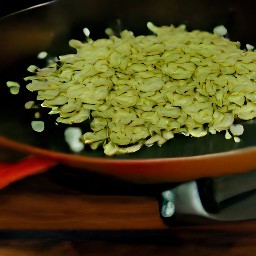a pan of cooked fennel with garlic, lemon zest, and olive oil.
