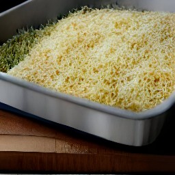 a dish with grated parmesan cheese on top that has been baked in a hot oven for 40 minutes.