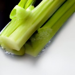 the celery sticks are rinsed using water.