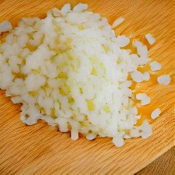a peeled and chopped onion, and small cauliflower florets.
