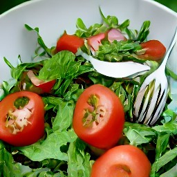 the output is a bowl of mixed tomatoes salad.