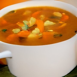 a pot of vegetable soup with ditalini pasta.