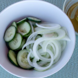 
Fresh, vegan and allergen-free chilled cucumber slices make a great appetizer or side dish - sweetened with just a touch of granulated sugar.