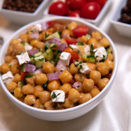 

This delicious gluten-free, nut-free and soy-free chickpea salad is a perfect side dish or meal: it combines crunchy cucumbers, juicy cherry tomatoes, creamy feta cheese and ranch dressing with protein packed chickpeas.