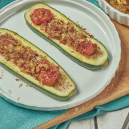 

A tantalisingly delicious Asian-Indian side dish, this gluten-free, eggs-, nuts- and soy-free garlic and tomato stuffed zucchini is baked with breadcrumbs and parmesan cheese for a truly irresistible treat.