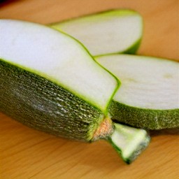 the zucchini is cut in half and rinsed.