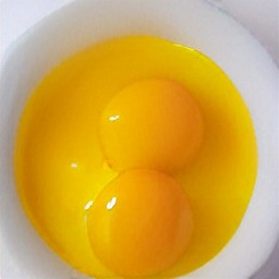 cracked eggs in a bowl.