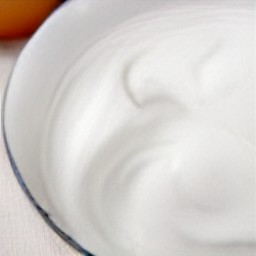 the egg whites are transferred to another bowl and mixed.