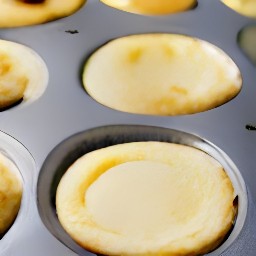 the cheese mixture is on top of each baked chocolate chip dough.