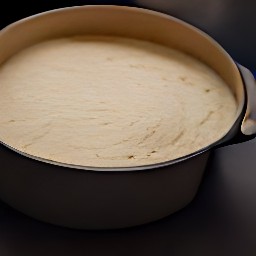 the batter is transferred to a baking dish that has been greased with 1 tbsp of vegetable oil.