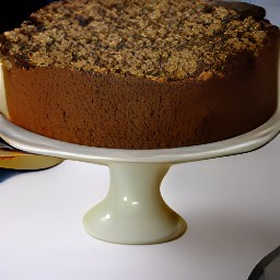 the crumbly mixture and chopped walnuts are scattered over the baking dish.