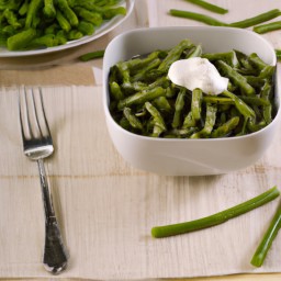 

A delicious, gluten-free, eggs-free, nuts-free and soy-free side dish of green beans cooked in butter and topped with creamy sour cream.