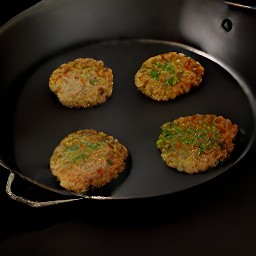 there two veggie patties remaining in the skillet and they will have been cooked for 4 minutes.