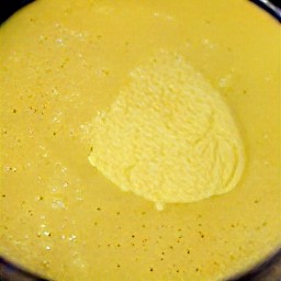 a bowl of beaten eggs.