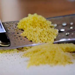the ginger is grated into small pieces.