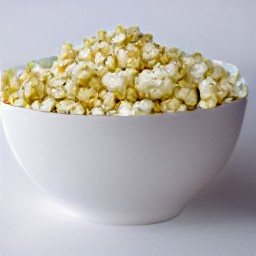 transferring the food to a serving bowl.