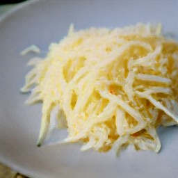 the mozzarella cheese is transferred to a plate.