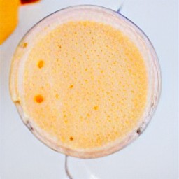 a smoothie made with soymilk, pumpkin puree, cinnamon, ground ginger, allspice, nutmeg, maple syrup and banana chunks.