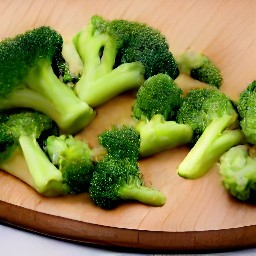 cut broccoli into florets, then peel and chop an onion. next, peel and mince a garlic clove. finally, destalk green bell pepper and dice it.