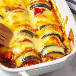 
Cheesy Baked Ratatouille is a flavorful, gluten-free and nuts-free European French dinner dish made from delicious eggplants, red onions, yellow bell peppers, zucchini tomatoes and thyme leaves topped with eggs plain yogurt and parmesan cheese.
