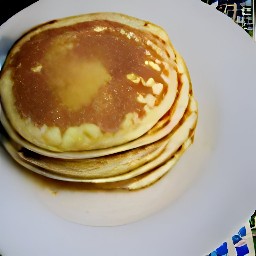 the pancakes are transferred to a plate.