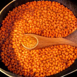 a curry flavored dish with red lentils.