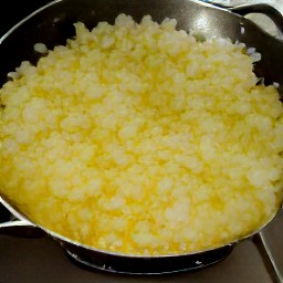 a pan of onions cooked in vegetable oil for six minutes.