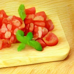 chopped tomatoes, spearmint, scallions, and parsley.