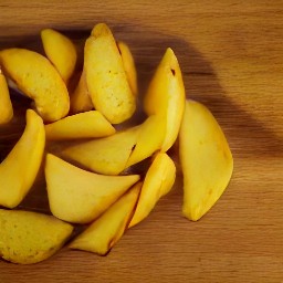 after peeling the russet potatoes with a peeler, cut them into wedges.