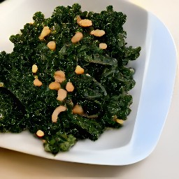 a dish of garlic, raisins, kale, salt, black pepper, and toasted pine nuts.
