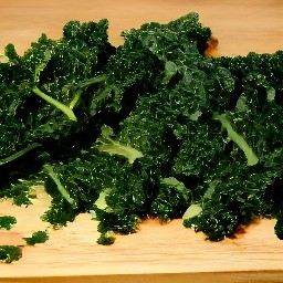 destalked and shredded kale, peeled and minced garlic cloves.