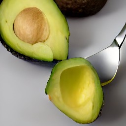 the avocado is now destoned and its skin has been removed with a spoon.