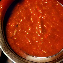 a bowl of thickened mixture that resembles salsa.