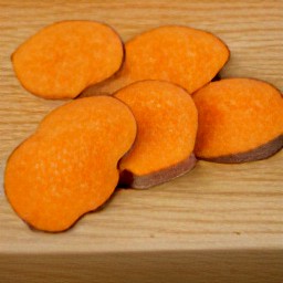 the sweet potato is cut into slices.