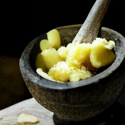 a paste made from the crushed garlic.